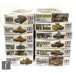 Twelve Tamiya 1:35 scale military plastic model kits, all tanks and armoured vehicles, to include