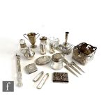 A parcel lot of assorted silver and other items to include a square bottle sleeve, a small trophy,