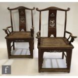 A pair of Chinese Huanghuali style official's chairs, (Republic Period 1912-1944), the yoke shaped