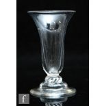An 18th Century jelly glass circa 1740, possibly Newcastle, the flared round funnel bowl above a