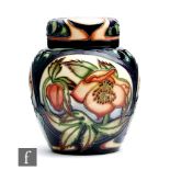 A Moorcroft Pottery ginger jar and cover decorated in the Ashwood Gold pattern designed by Emma