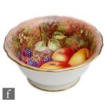 A Royal Worcester Fallen Fruits high sided bowl decorated to the interior by Freeman with hand