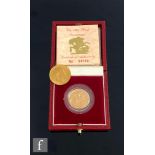 An Elizabeth II full sovereign dated 1988 and an Edward VII example dated 1909. (2)