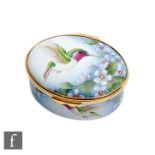 A Moorcroft Enamels Collectors Club oval box and cover decorated in the Shintaki pattern designed by