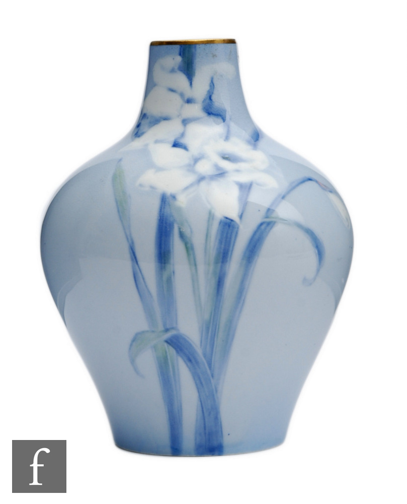 An early 20th Century Doulton Burslem Art Nouveau vase decorated with two daffodils against a pale