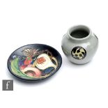 Two pieces of Moorcroft Pottery comprising a Queen's Choice pattern pin dish decorated in the