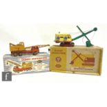 Two Dinky Toys, 975 Ruston Bucyrus Excavator in yellow with green jib and red chassis, with