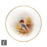 A small hand painted Royal Worcester pin dish decorated with a hand painted teal, titled verso,