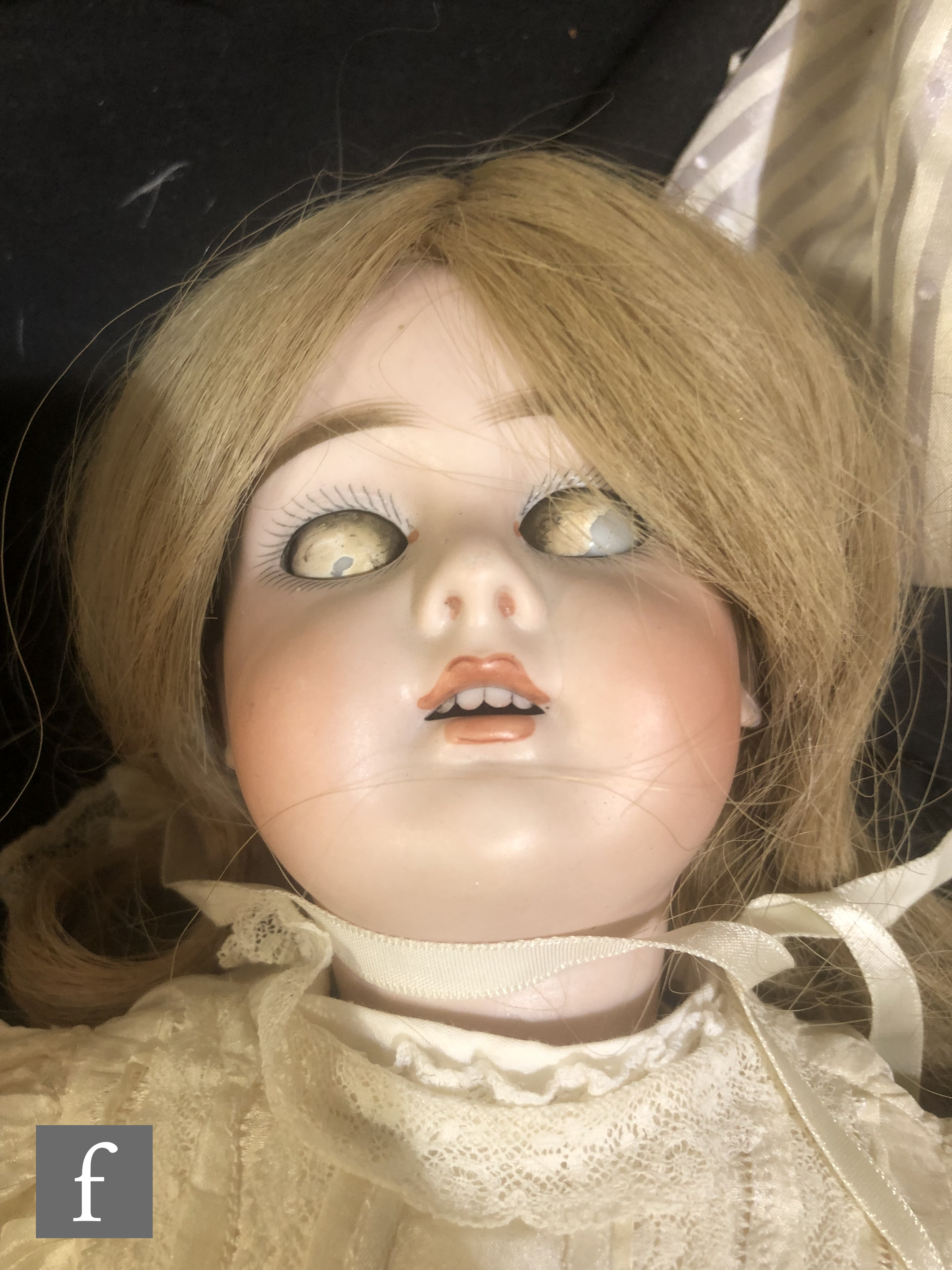 An unmarked German bisque socket head doll, with sleeping brown eyes, open mouth with teeth, painted - Image 2 of 6