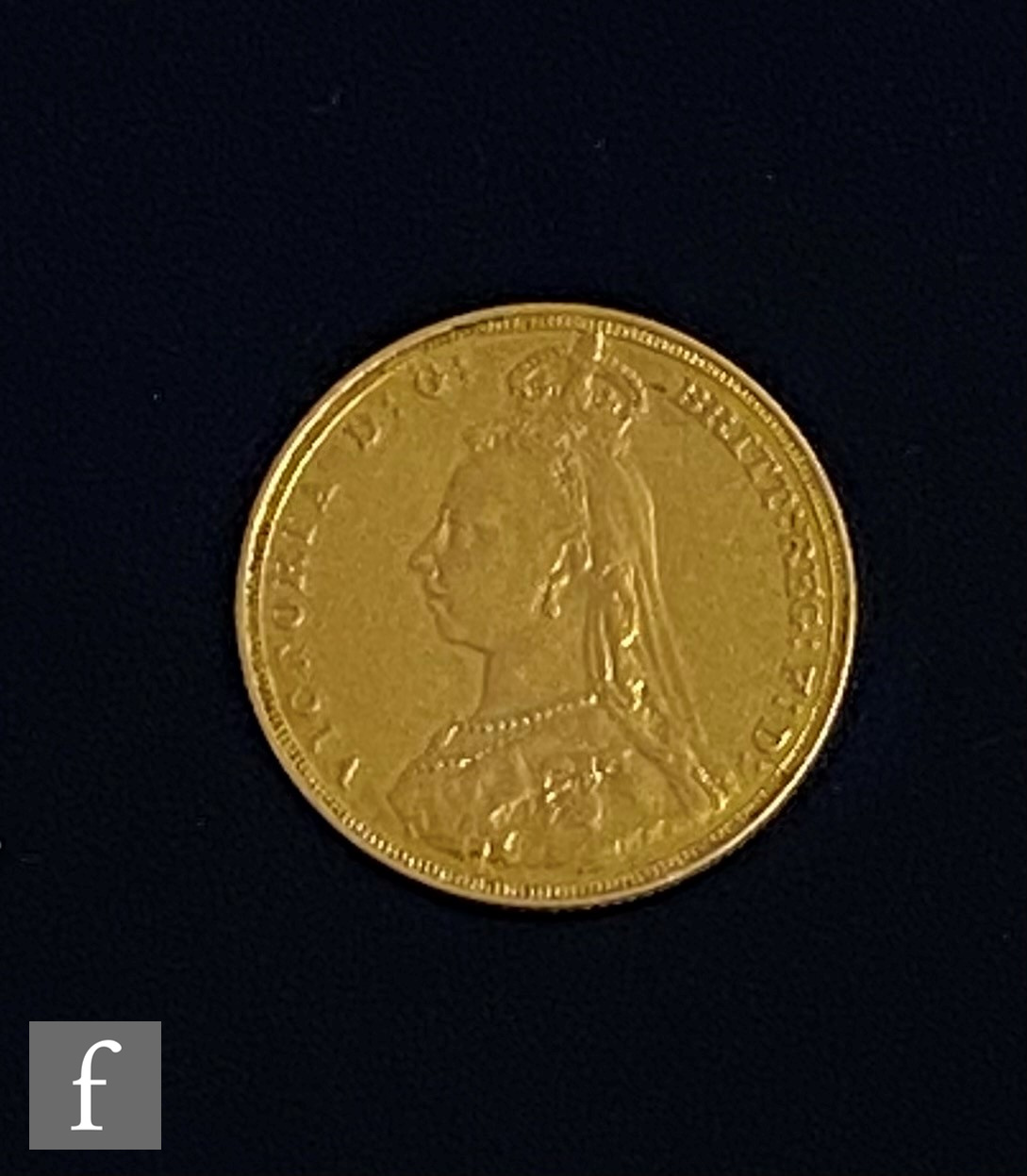 A Victorian full sovereign dated 1887.