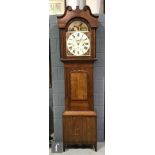 A 19th Century oak and mahogany cross-banded longcase clock with a thirty hour movement, the hood