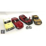 A collection of assorted unboxed larger scale diecast models by Maisto, Solido and similar, some