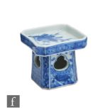 A Chinese blue and white square section tazza, probably early 19th Century, the tapered high sides