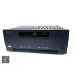 An Arcam AVR 450 power amplifier AV receiver, serial no. FV45R01059, with original packaging, remote