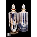 A pair of 19th Century clear crystal glass apothecary or drug jars of shouldered cylindrical form