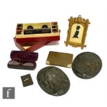 A small collection of assorted collectables comprising a pair of bronze plaques showing Dante and