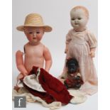 An Armand Marseille bisque socket head doll with sleeping blue eyes, open mouth with two teeth,
