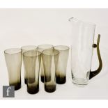 A 1950s Italian crystal glass jug of slender cylindrical form with an applied tapered sage green