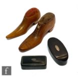 Two late 19th Century treen pin cushions formed as pointed shoes, together with two snuff boxes. (4)