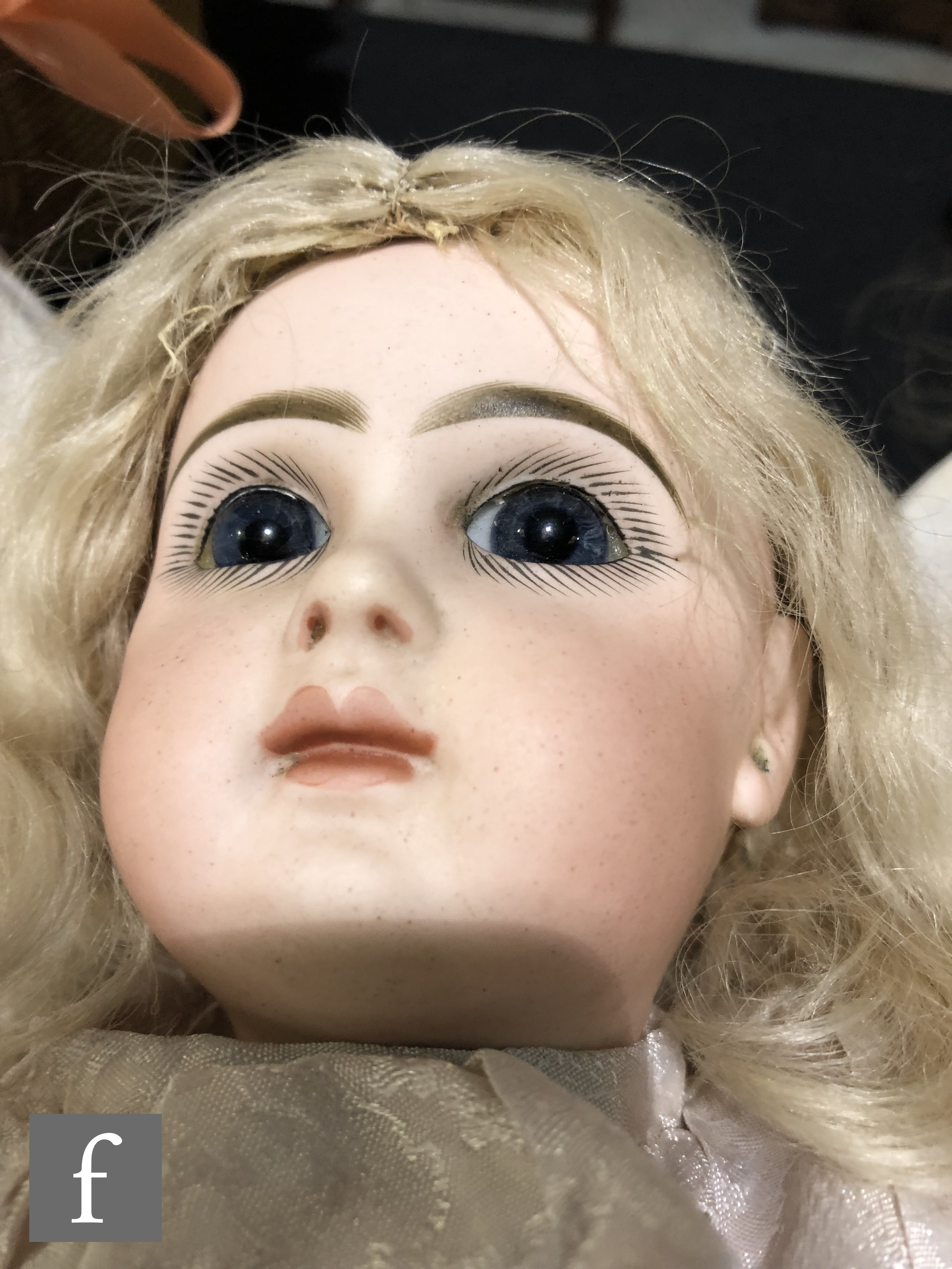 An unmarked French bisque head doll, probably Jumeau, with fixed blue paperweight eyes, painted - Image 3 of 7
