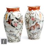 A pair of early 20th Century Japanese Kutani vases of rounded ovoid form, decorated with quail