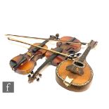 A 20th Century violin, 36cm, another similar, 34cm, and a bow, all unnamed, and a mother of pearl