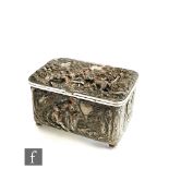 A 19th Century silver plated casket profusely decorated with figures in a woodland setting,