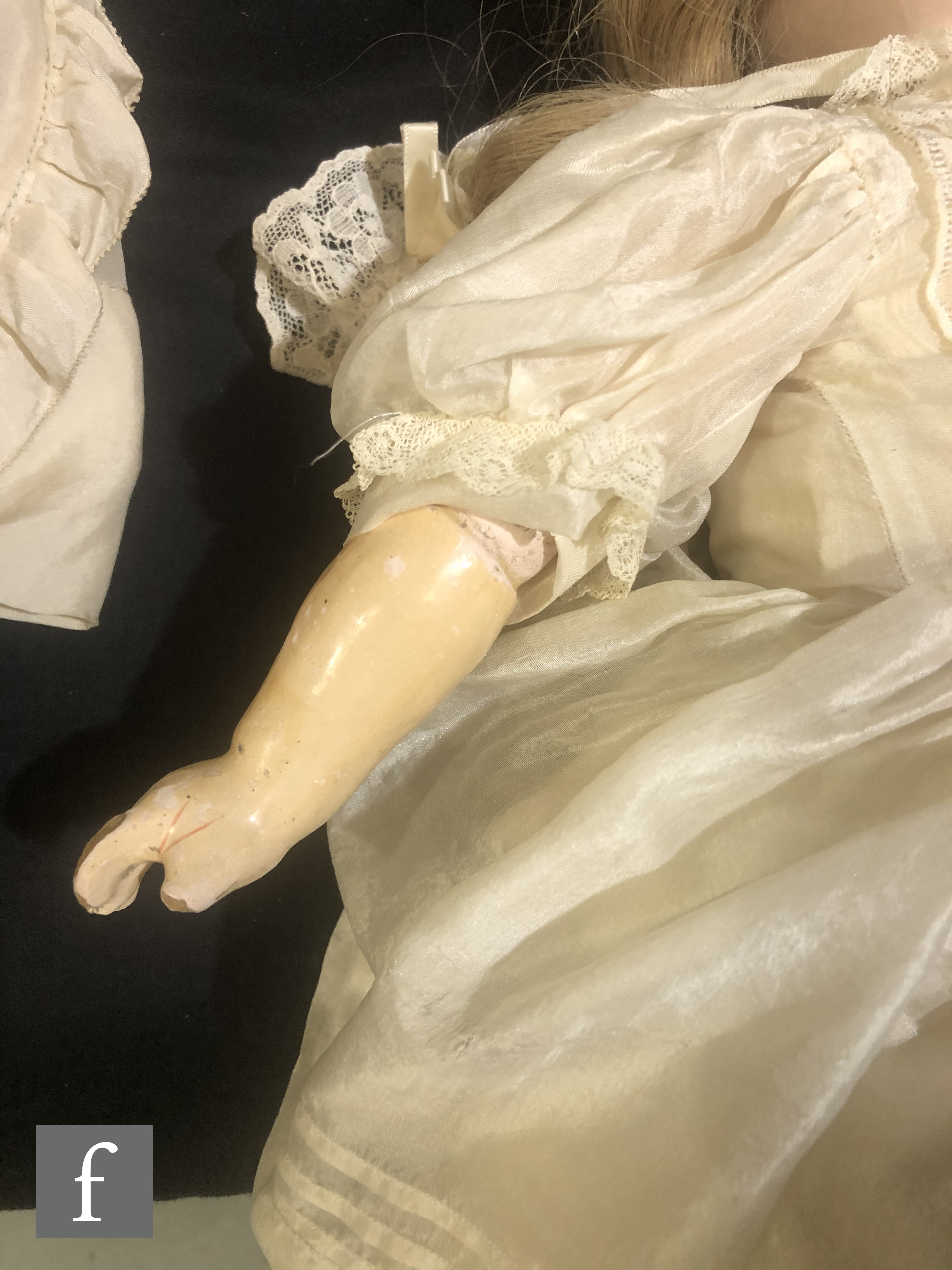 An unmarked German bisque socket head doll, with sleeping brown eyes, open mouth with teeth, painted - Image 3 of 6