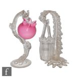 A late 19th Century hanging posy vase, the spherical posy in pink over opal with pinched rim and