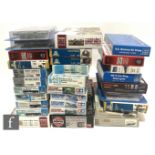 A quantity of military related weapons and accessories plastic model kits, of various scales and