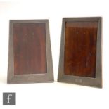 A pair of Art Deco hallmarked silver tapering rectangular easel photograph frames each with initials