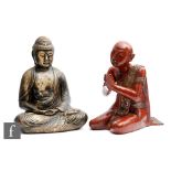Two South East Asian painted Buddhist figures, to include a figure of a seated Shakyamuni Buddha