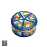 A Moorcroft Enamels circular trinket box decorated with hand painted British birds (robin,