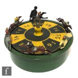 A 1930s Trueline Tool Co. Victory Race Game with cast horses on revolving drum, with instruction