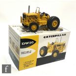 A Caterpillar 1:25 scale die cast model DW 20 Series E Four Wheel Tractor, 49-0218, complete with