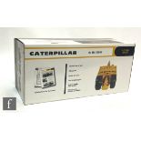 A Caterpillar 1:25 scale die cast model No. 456 Scraper, 49-0247, complete with brochure and box.