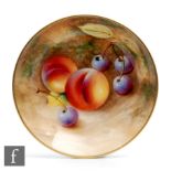 A Royal Worcester Fallen Fruits pin tray coaster decorated by Roberts with hand painted peaches