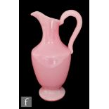 A large 20th Century pink alabaster jug, of shouldered compressed ovoid form with applied loop