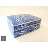 A Chinese 18th Century blue and white lidded box, of rectangular form, the two section box,