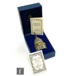 A boxed Halcyon Days Enamels musical trinket box modelled as the dome of St Paul's Cathedral opening