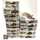 Fifteen Tamiya 1:35 scale plastic model kits, all military vehicles, to include 32407-3000 British