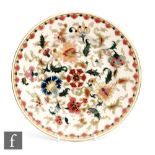 An early 20th Century Zsolnay Pecs plate with Persian decoration, impressed and printed mark,