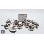 Sixty early to mid 20th Century tin flat figures, eighteen modelled as medieval soldiers with