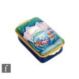 A Moorcroft Enamels rectangular trinket box decorated with hand painted flag iris before a