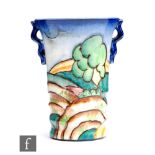 Carlton Ware - A small 1930s Art Deco twin handled vase decorated in the Tubelined Tree and Fields