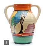 Clarice Cliff - Blue Autumn - A 10 inch twin handled Lotus jug circa 1930, hand painted with a