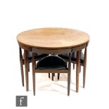 Hans Olsen - Frem Rojle, Danish - A teak circular nesting dining table and four chairs raised to