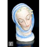Unknown - A 1940s Italian art pottery bust of a lady with a blue scarf over her blonde hair and