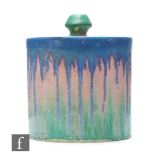 Clarice Cliff - Delecia - A drum shaped preserve pot and cover circa 1932, hand painted with tonal