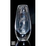 Kosta - A small clear crystal vase of compressed tear drop form, engraved with two fish swimming